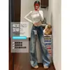 Jeans acampanados azul claro no ajustados para mujer, nuevo estilo americano de otoño 2026, de tiro bajo, para petite, de largo hasta el suelo, tipo campana
