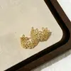 Pendientes de Botón de Flor para Mujer Lujo Ligero Diseño de Nicho Pendientes para el Trabajo Sensación de Alta Gama Cierres de Pendiente Comercio Electrónico Transfronterizo