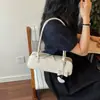 Bolsa Baguete Simples Retrô de Textura de Alta Qualidade 2026 Verão Nova Moda de Nicho Versátil Elegante Bolsa de Ombro de Mão