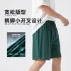 Pantalones cortos deportivos de hombre de venta caliente transfronterizos de secado rápido, pantalones largos rectos de longitud media de seda helada de verano nuevos, en stock de comercio exterior