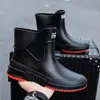 Botas de lluvia para hombres y mujeres, zapatos impermeables para cocina y obras de construcción, botas cortas de goma cálidas de algodón polar engrosado para exteriores, venta al por mayor de botas de lluvia