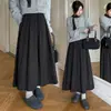 Falda media acolchada de estilo coreano para otoño e invierno para mujer, cintura elástica, adelgazante, forrada de polar, falda de longitud media con bolsillos, falda de línea A