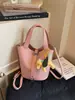 Bolso de mano tipo cubo de cuero suave simple estilo coreano para mujer, Nuevo modelo 2026, Bolso de hombro cruzado, Bolso tote pequeño súper popular para salir