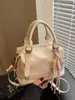 Bolsa Pequena Exclusiva Externa Feminina Nova Moda Primavera e Verão 2025 Bolsa Transversal Feminina Portátil Bolsa Boston Almofada