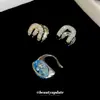 Pendientes Ovalados Huecos Super Brillantes de Circonita Estilo Coreano Sentido de Diseño de Nicho Ear Cuff para Orejas sin Perforar Personalidad Versátil Cierres de Pendiente