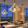 Lámpara de araña de jaula de pájaros de madera vintage estilo japonés transfronteriza, creativa para restaurante, comedor rústico, lámpara de tatami, iluminación de Zhongshan en stock