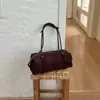 Bolso de mujer de gran capacidad 2026 nuevo bolso de hombro casual de nicho vintage con un toque de alta gama para el trabajo y los desplazamientos, bolso tipo almohada