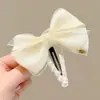 Elegante presilha frontal com design de bico de pato, presilha lateral fofa para fios soltos, pequeno grampo floral estilo Chanel, novo modelo 2026 de acessório de cabelo