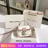 Una generación de bolsa de caja portátil de color contrastante de cuero para cabello 2024 nueva bolsa de cosméticos cruzada al por mayor
