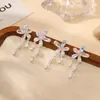 Pendientes de Botón Super Hada Lujo Bosque Estilo Flor Mariposa Borla para Mujer Nicho Exquisitos Gama Alta Dulces Elegantes Versátiles