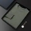Primavera 2025 Nuevo Suéter Casual de Punto Plano de Color Sólido con Cuello Redondo para Hombre Suéter de Punto Suave y Sedoso Cachemir de Primera Línea