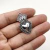 Pendientes y collares colgantes de aleación con forma de corazón gótico vintage de AliExpress, disponibles transfronterizamente en Europa y Estados Unidos.