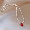 Corrente para Clavícula Feminina de Pérola e Contas Vermelhas de Luxo Leve de Nicho Elegante Versátil Novo Estilo 2025