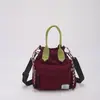 Bolso de cubo con cordón transfronterizo, nuevo bolso de mano casual de color liso estilo coreano, bolso cruzado simple de moda para mujer