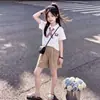 Top de manga corta con cuello polo de personalidad simple para niña, nuevo de verano, casual, holgado, versátil, conjunto de dos piezas para niña