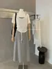 Conjunto de Tres Piezas Y.Jia: Camiseta de Manga Corta para Hombro Derecho + Chaleco Adelgazante + Falda Casual de Línea A con Cordón