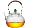Tetera de vidrio con patrón de martillo tetera con asa de cobre tetera resistente a altas temperaturas tetera para juego de té Kung Fu