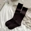 Nueva Colección Otoño/Invierno 2026: Calcetines hasta la rodilla estilo universitario, Algodón, Color liso, Sin costuras, Versátiles, Adelgazantes, y Calcetines hasta el tobillo para mujer, Al por mayor