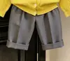 Roupas infantis estilo coreano coleção outono 2026: cardigã de tricô com tranças amarelo bordado e calça casual de perna larga para meninos e meninas