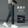 Pantalones de negocios casual de alta gama para otoño e invierno para hombre, pantalones grises rectos de corte slim, nuevos pantalones de invierno para hombre con forro polar 2026