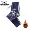 Pantalones de chándal gruesos y cálidos con forro de forro polar, nuevos para invierno, unisex, con tres rayas, pierna recta, puños, moda casual, joggers
