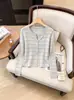 Cardigan de Punto Delgado de Moda con Temperamento Suave para Mujer 2026 Nuevo Principios de Otoño Nicho Versátil Impresionante Top Base