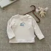 Camiseta de manga larga para niños de 1 a 3 años, nueva prenda superior de estilo coreano para otoño e invierno con cuello medio alto, ropa interior cálida para bebés y niños pequeños
