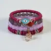 Venta Caliente Transfronteriza Estilo Bohemio Ojo Maligno Palma Aleación Colgante Cuerda Elástica Multicapa Pulsera de Perlas
