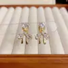 Pendientes de Clip de Moda de Nicho Versátiles de Corazón Completo de Diamante con Moño, Temperamento Único y Diseño Simple, Pendientes Súper Brillantes al por Mayor