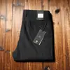 Estación europea primavera y verano fino cliente suministrado sarga tejida algodón moderno lujo ligero para hombre rectos holgados pantalones casuales de negocios
