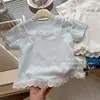 Verão 2026 Novo Estilo Coreano Fashionável Infantil Menina Falso Duas Peças Renda Acabamento Manga Curta Camiseta Top Tendência