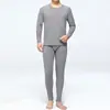 Camiseta de capa base de terciopelo alemán de doble cara engrosada autocalentable temperatura constante ropa de otoño conjunto de pantalones de otoño invierno terciopelo alemán ropa interior cálida conjunto de hombre