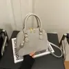 Bolsa de Mão da Moda Tendência de Nicho para Mulheres 2026 Novo Estilo Versátil Bolsa Concha Elegante Bolsa Transversal para o Dia a Dia