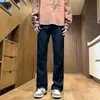 Pantalones de diseño de botones a presión para hombre, tendencia otoñal estilo americano transfronterizo, jeans de pierna recta de alta calle con estilo moderno