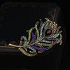 Broche Vintage Nuevo de Pluma de Pavo Real con Pedrería Traje de Mujer Atmosférico de Alta Gama Pin Corsage de Diamantes Ropa de Metal