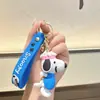 Pingente de chaveiro Snoopy de desenho animado da moda, acessório para bolsa de casal de barraca de rua, pequeno presente para máquinas de garra, atacado