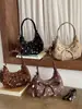 Diseño de nicho transfronterizo, bolso de mano pequeño retro, bolso cruzado para mujer, nueva tendencia de moda 2026, bolso de hombro casual para mujer