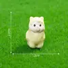 Una colección de adorables figuritas de animales en miniatura para crear paisajes en miniatura, perfectas para decoraciones de casa de muñecas DIY, adornos para coche y expositores de escritorio