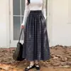 Falda de cuadros artística vintage para mujer, estilo principios de otoño, cintura alta elástica, dobladillo amplio, que cubre la cadera, falda de cuadros adelgazante