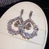 Pendientes de gota de agua con incrustaciones de diamantes completos y aguja plateada para mujer, pendientes de lujo ligero de alta gama, pendientes de lujo para vestido de fiesta al por mayor