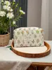 Nova Bolsa de Maquiagem Acolchoada Floral Feminina Necessaire de Viagem Portátil Bolsa de Armazenamento para Cosméticos Batom Carteira