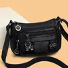 Bolso de mujer con textura de cuero suave, nuevo modelo 2026, simple y elegante, versátil, bolso para mamá, color liso, de hombro cruzado moderno para mujer