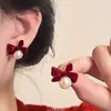 Pendientes de Copo de Nieve de Terciopelo para Mujer Nicho de Gama Alta Pendientes Rojos de Año Nuevo Otoño e Invierno 2025 Nuevo Estilo Caliente Pendientes de Año Nuevo