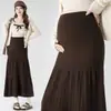 Nuevo faldón midi de punto para otoño e invierno para mujeres embarazadas, con rayas verticales, silueta en A, un diseño que cubre la barriga y crea un efecto adelgazante, y un bajo de cola de pez que se puede usar como capa exterior