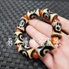 Pulsera de jade con cuentas Sky de tres ojos en blanco y negro Jarrón con cuentas Sky de nueve ojos verdes Pulsera luantong de cuentas Sky Pulsera retro Wenwan