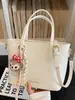 Bolso Cubo Elegante y de Moda de Shuai Mi para Mujer, Nuevo Modelo 2026, Bolso de Hombro Sencillo para el Trabajo, Bolso Cruzado de Hombro de Alto Valor