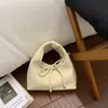 2026 Bolsa de Mão Matte da Moda Retro Fashion Simples Versátil Diária Bolsa de Ombro Texturizada Bolsa Transversal com Laço