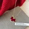 Buena suerte en el camino: Nuevo Collar de Caballo de Terciopelo Rojo Estilo Chino para Mujer, Sensación Vintage de Alta Gama, Cadena Larga para Suéter para el Año del Caballo, Venta al por Mayor