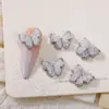 Libro Rojo Explosiones Manicura Joyería Aleación Grava Red de Mariposas Roja Nuevo Hielo Cristal Estéreo Mariposa Broca para Uñas Al por Mayor
