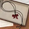 Colar com Laço Vermelho Ankora Design de Nicho Feminino Corrente para Suéter Aço Titânio de Alta Qualidade Pente Fino Colar de Corda Longa Preta